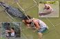 Tourist's dumb decision nearly costs him his life in crocodile enclosure
