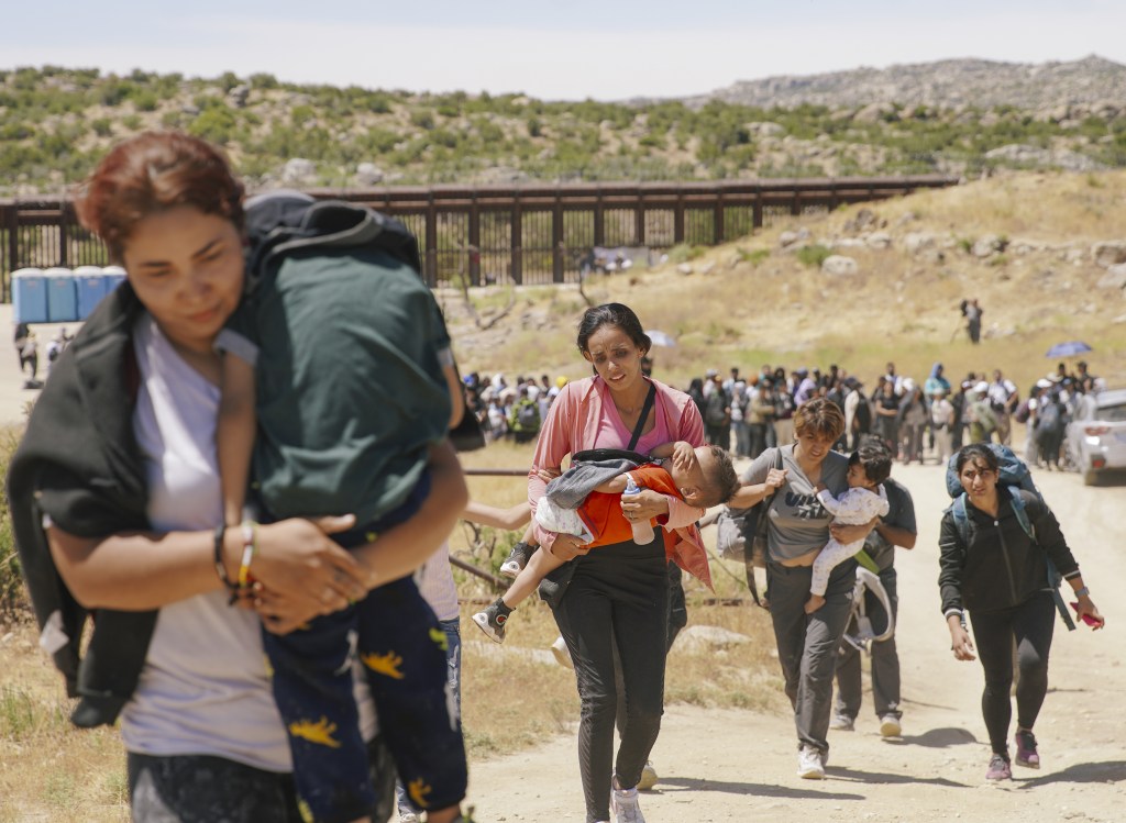 Hundreds of irregular migrants cross the border to Jacumba Hot Springs days after US President Joe Biden announced a decree to change migration policy at the border in California, United States on June 10, 2024.