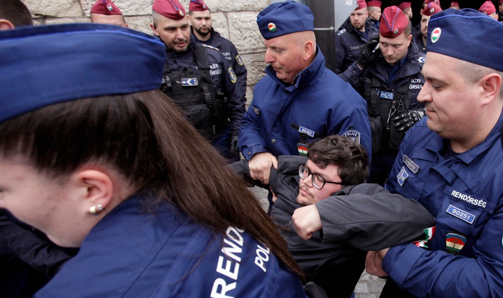 Police officers block protesters during a demonstration after the Hungarian parliament voted on constitutional amendments targeting the LGBTQ community, on the Chain Bridge in Budapest, Hungary, April 14, 2025.