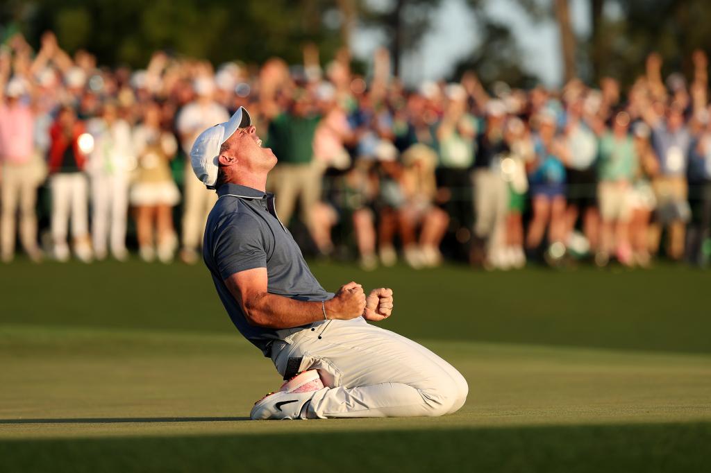 Rory McIlroy of Northern Ireland celebrates winning the 2025 Masters Tournament after the first playoff hole on the 18th green at Augusta National Golf Club on April 13, 2025 in Augusta, Georgia. 