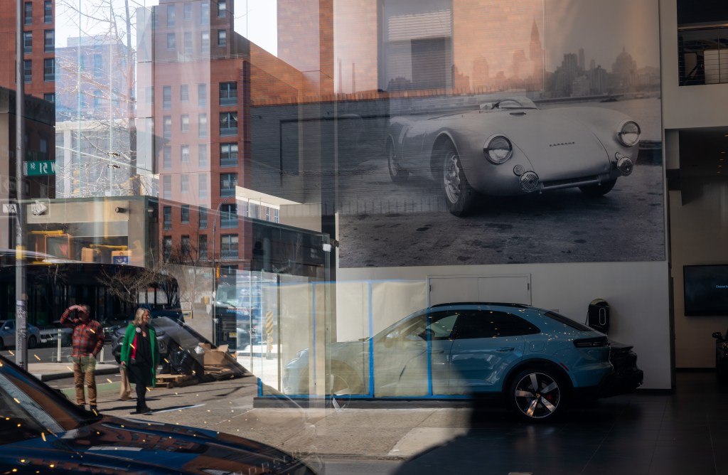 New Porsches are displayed at a dealership in Manhattan on April 01, 2025 in New York City.
