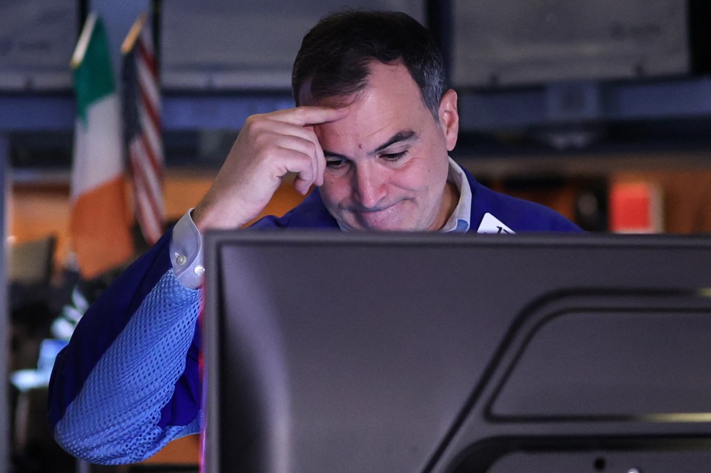 A trader works on the floor of the New York Stock Exchange