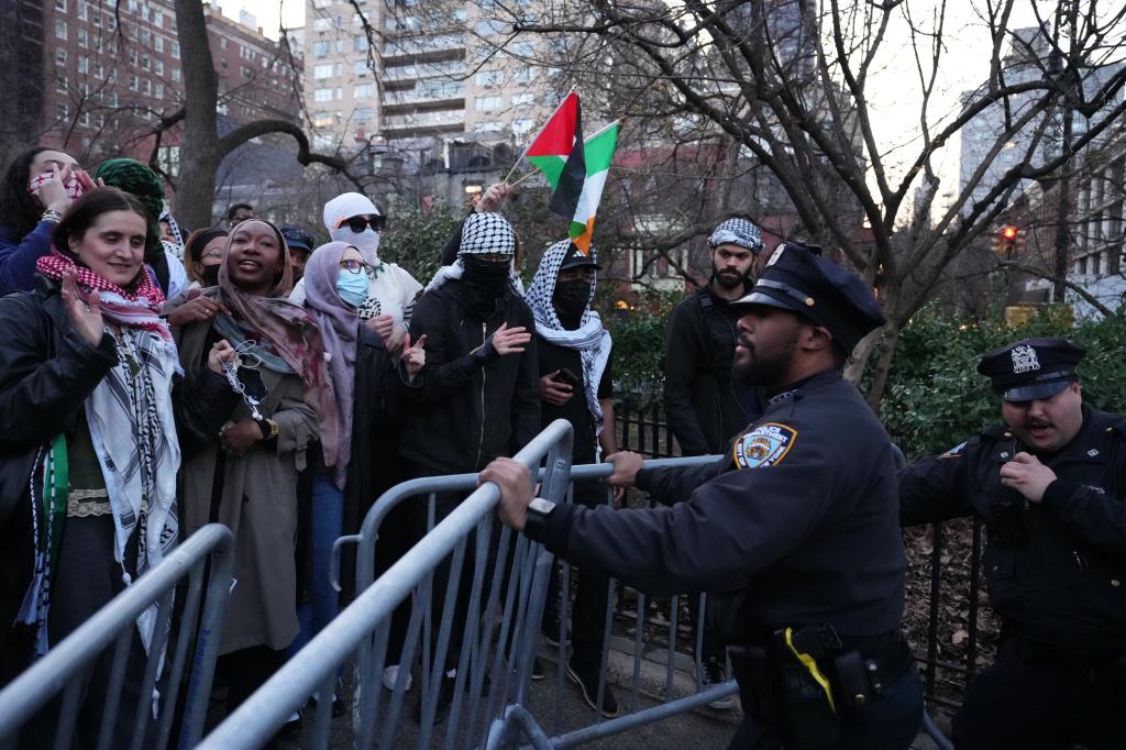 Protesters confront members of the New York City Police Department during a pro-Palestine demonstration against Mayor Eric Adams