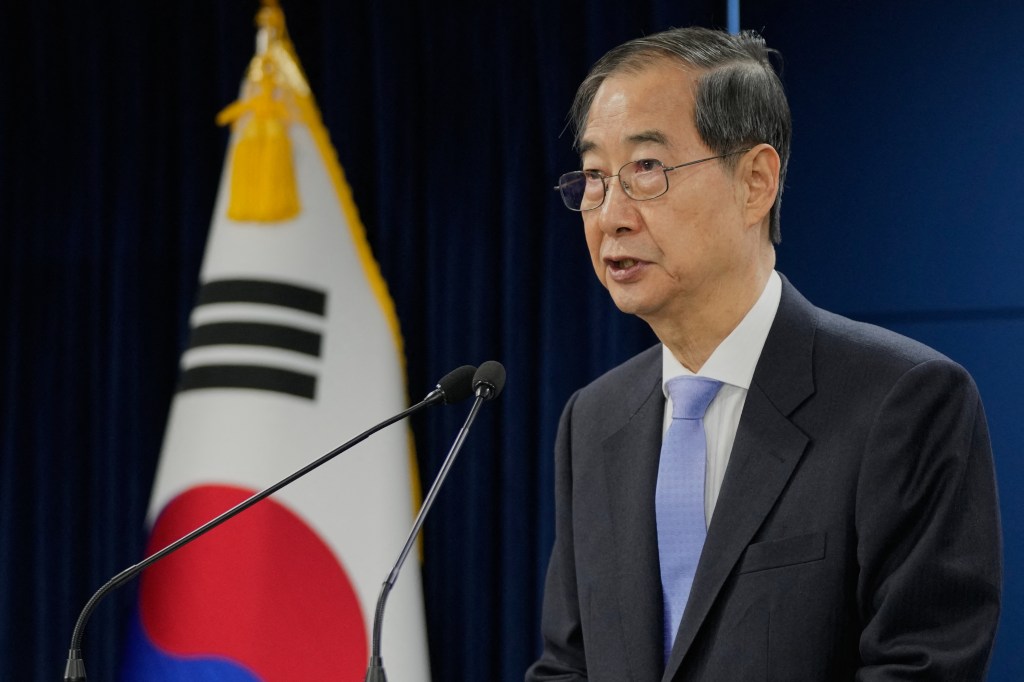 South Korean acting President Han Duck-soo speaks during a briefing at the Government Complex in Seoul on March 24, 2025.