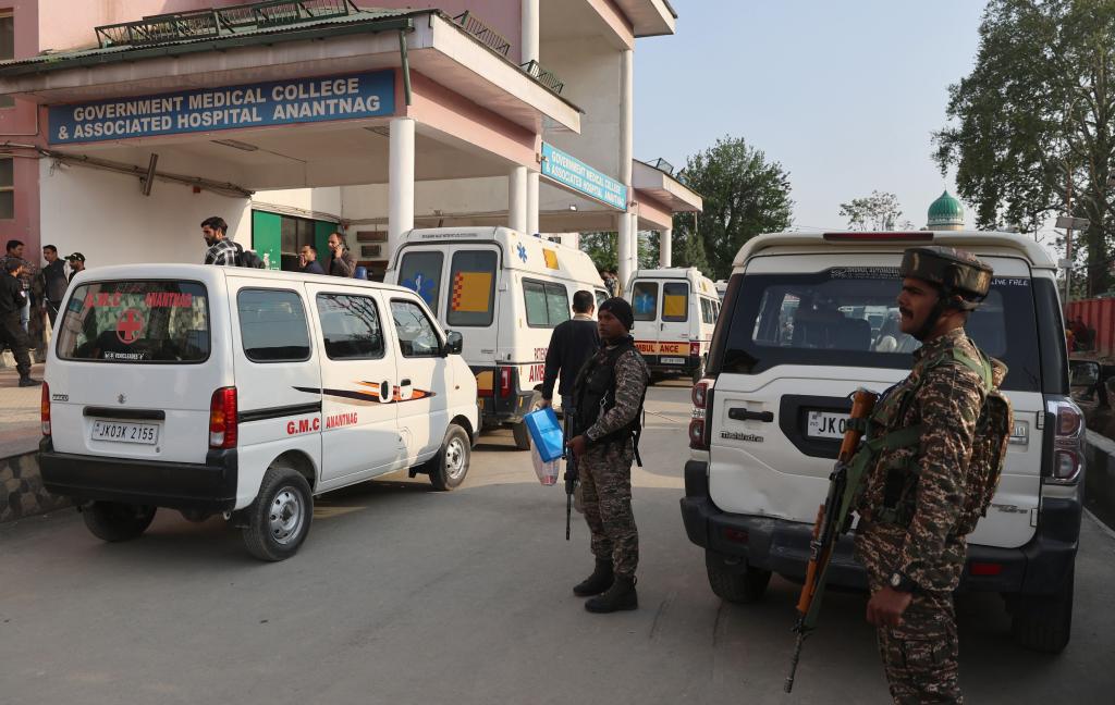 Security forces in uniform standing guard at a government hospital in Anantnag, India following a suspected terrorist attack on tourists, 22 April 2025