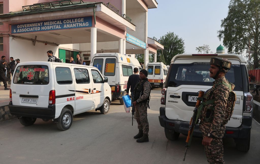 Security forces in uniform standing guard at a government hospital in Anantnag, India following a suspected terrorist attack on tourists, 22 April 2025