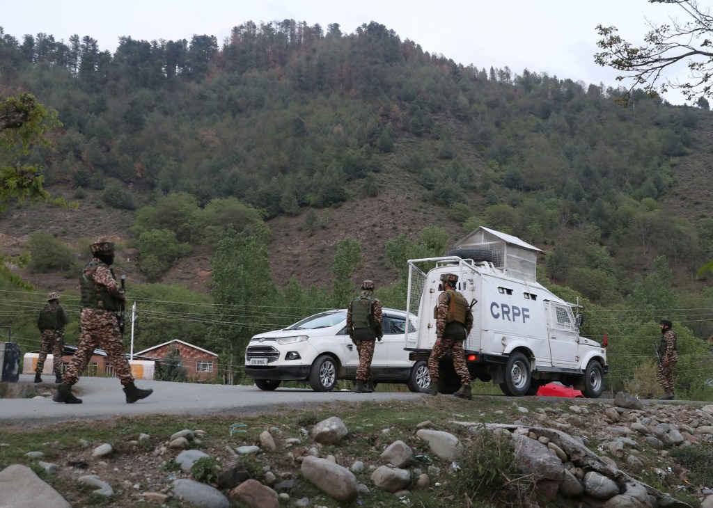 Indian paramilitary soldiers standing guard on Anantnag Pahalgam road, south of Srinagar, India after a terrorist attack on tourists, April 22, 2025.