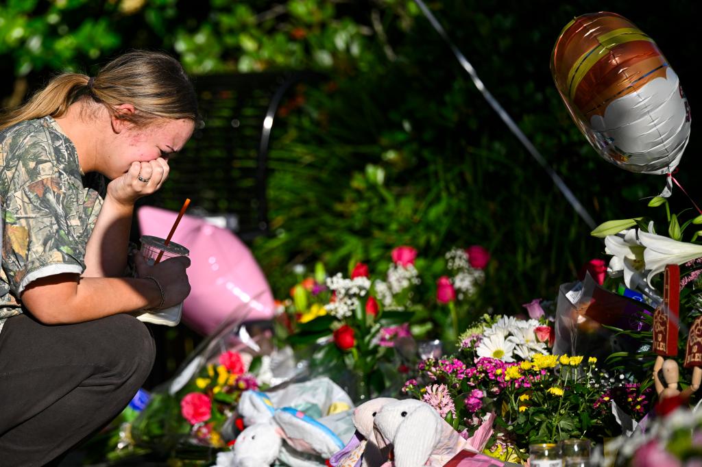 Student honors the deceased and injured students near the scene of a shooting at the Florida State University student center on April 18, 2025 in Tallahassee, Florida. 