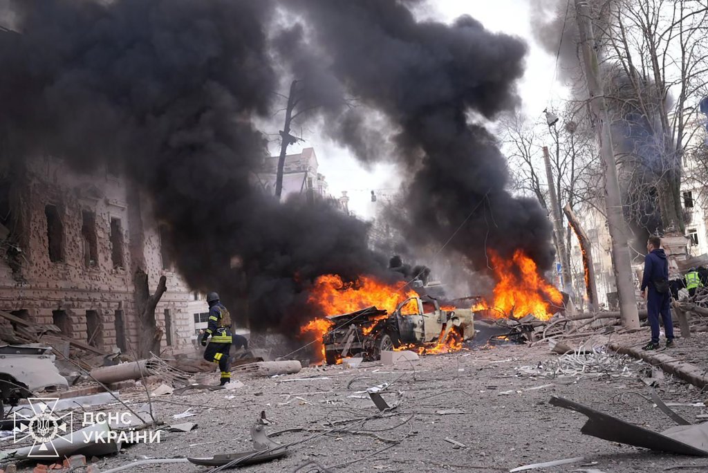 Ukrainian rescuers working at the site of a missile attack in Sumy, northeastern Ukraine, amid the Russian invasion of Ukraine, on Suday on April 13, 2025.