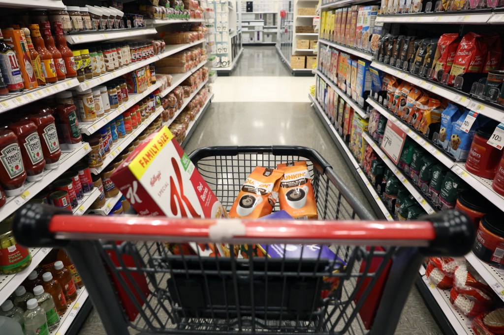 Shopping cart with groceries.