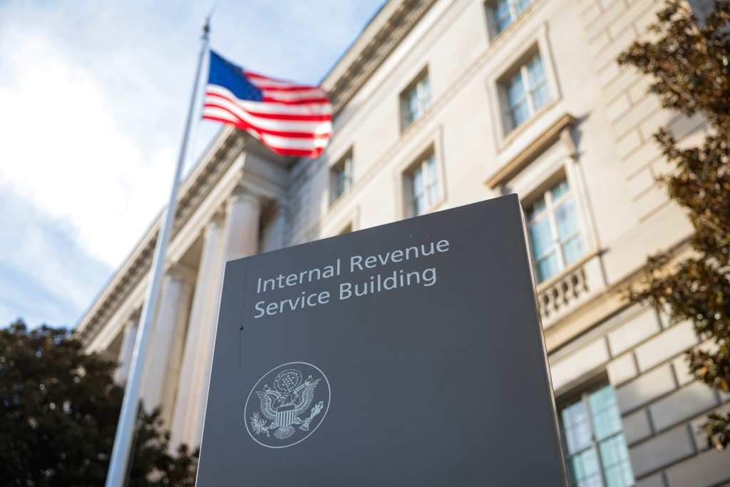 A sign for the Internal Revenue Service (IRS) is seen outside its building on February 13, 2025 in Washington, DC. 