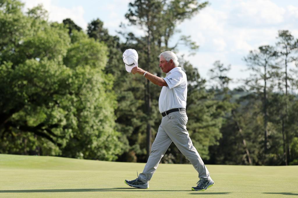Fred Couples of the United States reacts as he walks on the 18th hole during the second round of the 2025 Masters Tournament at Augusta National Golf Club on April 11, 2025 in Augusta, Georgia.