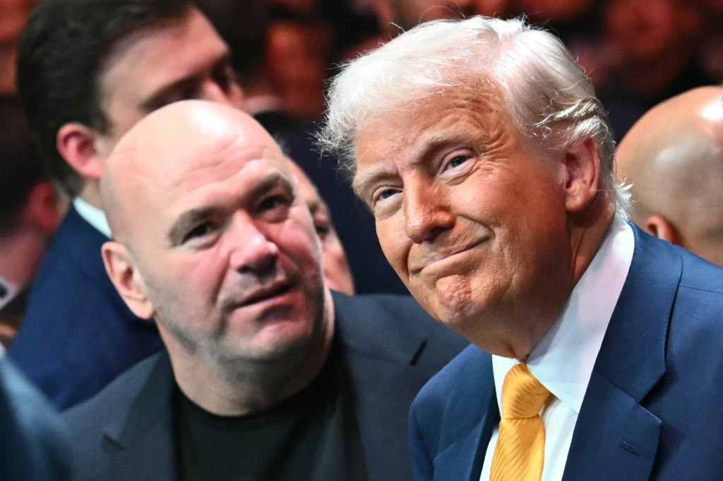President Donald Trump sits cageside next to Dana White at UFC 314 at the Kaseya Center in Miami, Florida on April 12, 2025.
