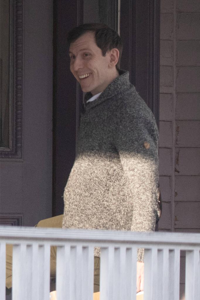 Erik Per Sullivan, known for his role as Dewey on the sitcom Malcolm in the Middle, is pictured leaving his house and picking up a coffee in Boston.