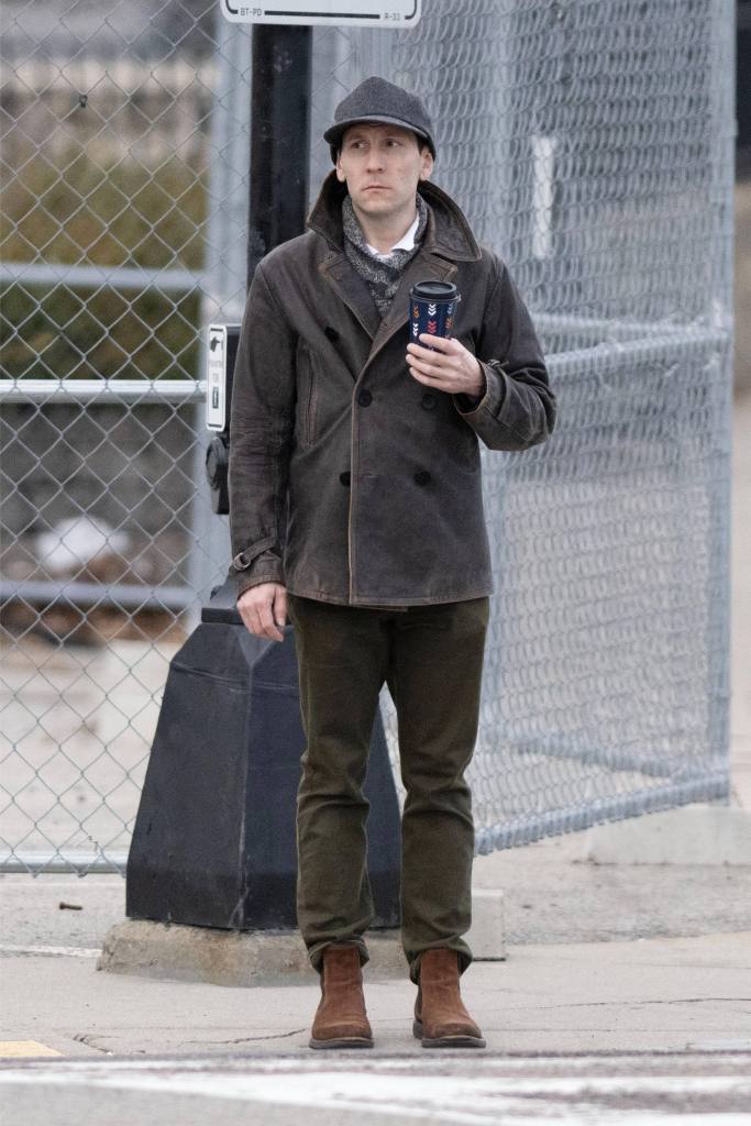 Erik Per Sullivan, known for his role as Dewey on the sitcom Malcolm in the Middle, is pictured leaving his house and picking up a coffee in Boston.