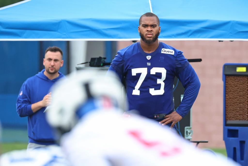 New York Giants offensive tackle, Evan Neal (73), in blue jersey, practicing at the Giants Training Camp in East Rutherford, NJ on July 24, 2024.