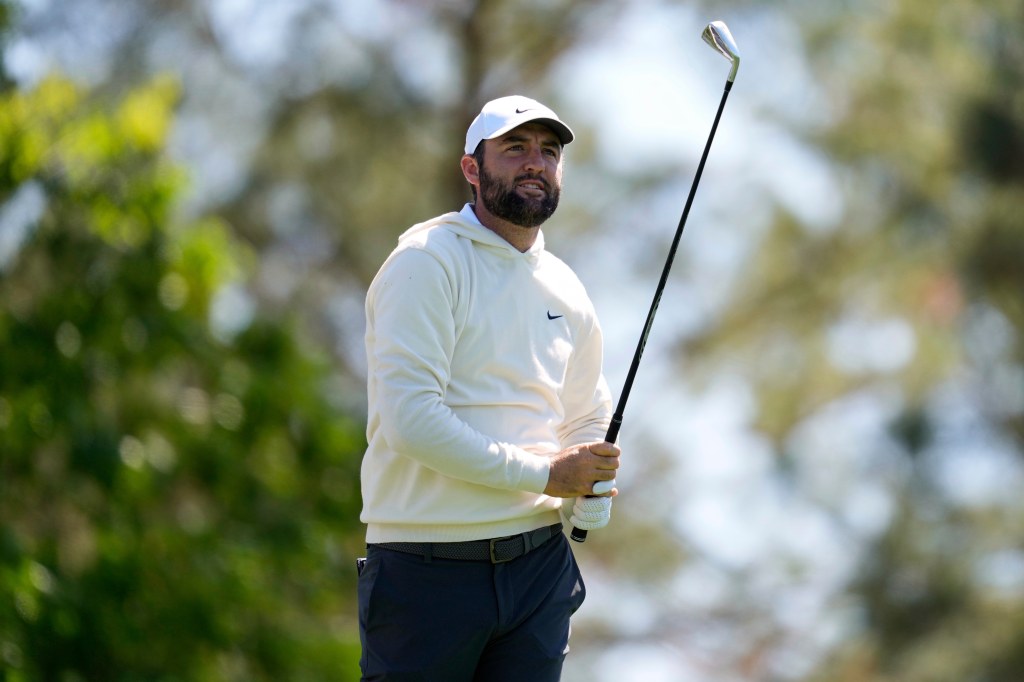 Scottie Scheffler hits from the fourth tee during a practice round at the Masters golf tournament, Tuesday, April 8, 2025, in Augusta, Ga.