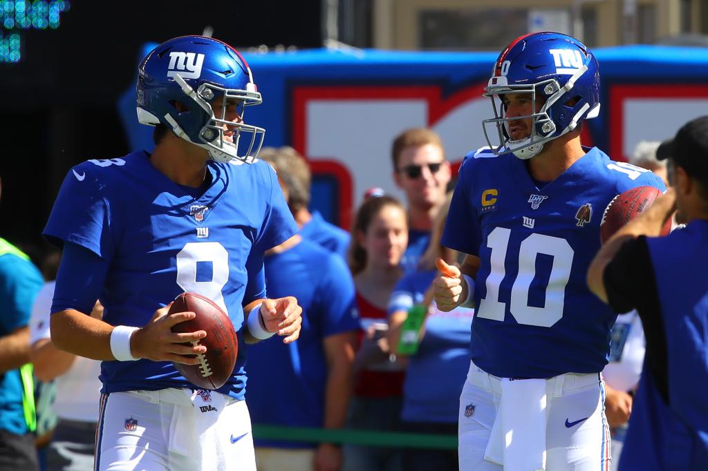 New York Giants quarterback Eli Manning (10) and New York Giants quarterback Daniel Jones (8) on the field prior to the National Football League game between the New York Giants and the Washington Redskins on September 29, 2019 at MetLife Stadium in East Rutherford, NJ. 