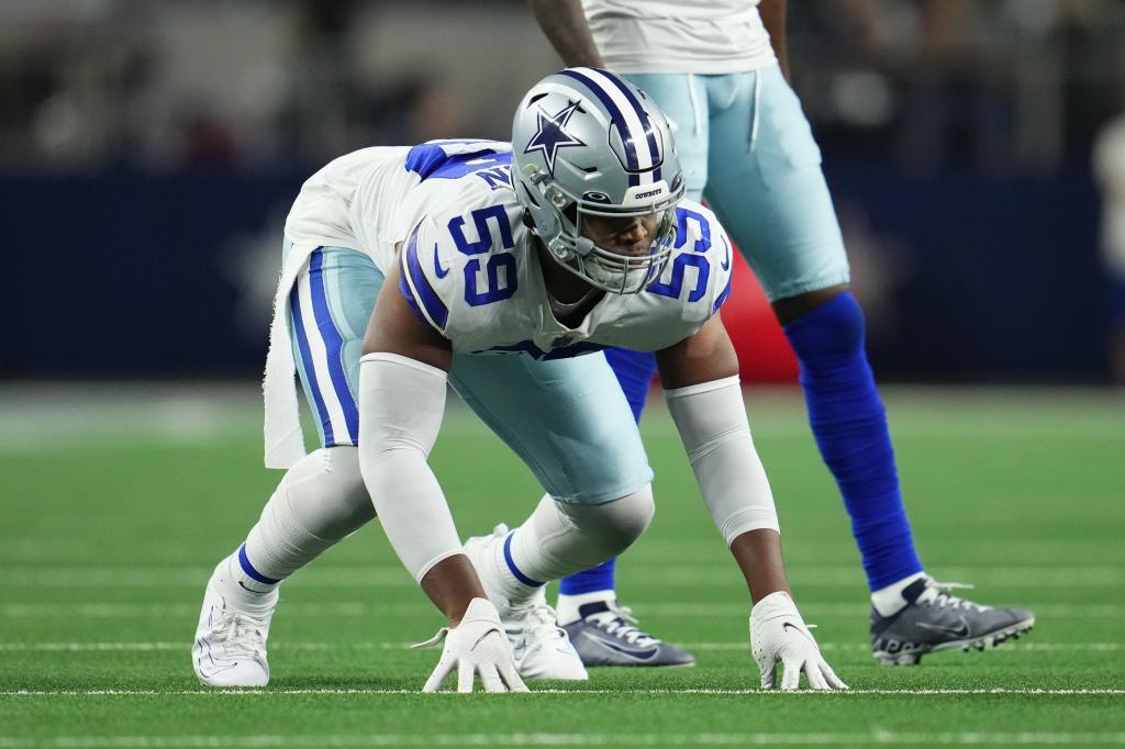 Chauncey Golston #59 of the Dallas Cowboys gets set against the Las Vegas Raiders during an NFL game at AT&T Stadium on November 25, 2021 in Arlington, Texas. 