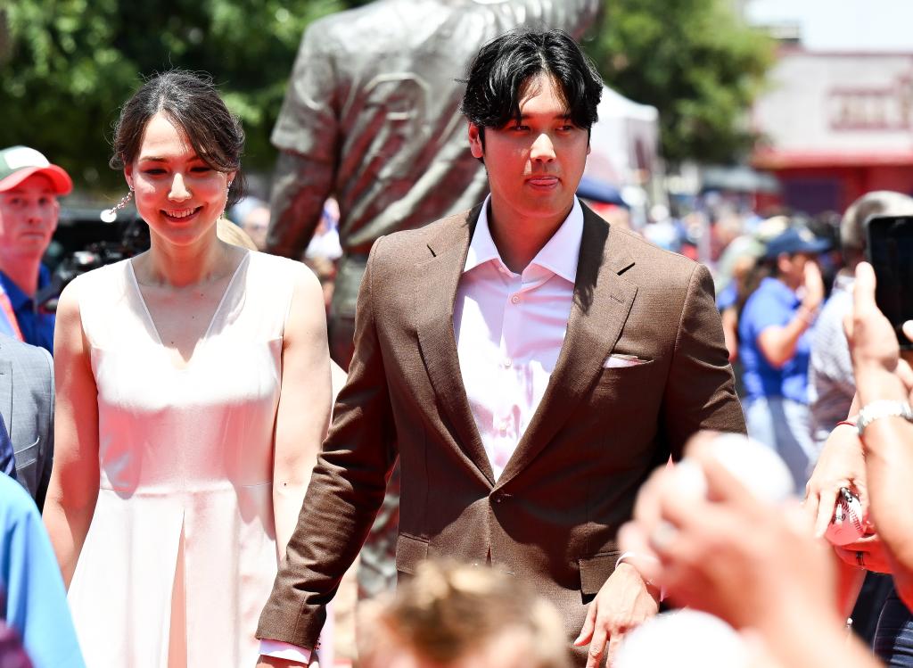Shohei Ohtani #17 of the Los Angeles Dodgers and his wife Mamiko Tanaka walk the red carpet during the All-Star Red Carpet Show presented by Frutitas Agua Fresca on July 16, 2024.