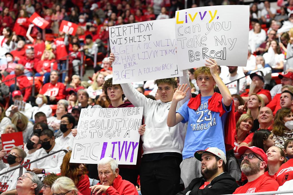 Fans hold signs for Olivia Dunne of LSU during a PAC-12 meet against Utah at Jon M. Huntsman Center on January 6, 2023 in Salt Lake City, Utah. 