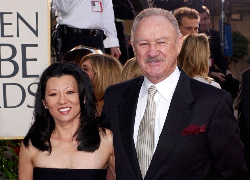 Gene Hackman arrives with his wife, Betsy Arakawa