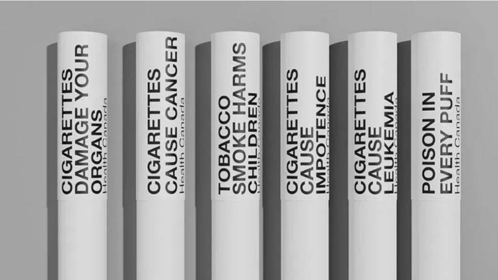 Group of white tubes with warnings in black text, indicating Australia's initiative to introduce on-product warnings, following Canada