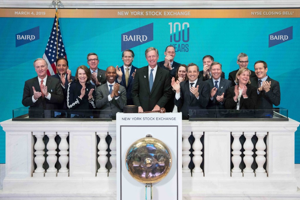 The image above shows Baird executives at the New York Stock Exchange in this 2019 file photo.