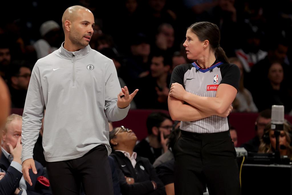 Brooklyn Nets head coach Jordi Fernandez in a discussion with referee Natalie Sago during a game against the Atlanta Hawks at the Barclays Center