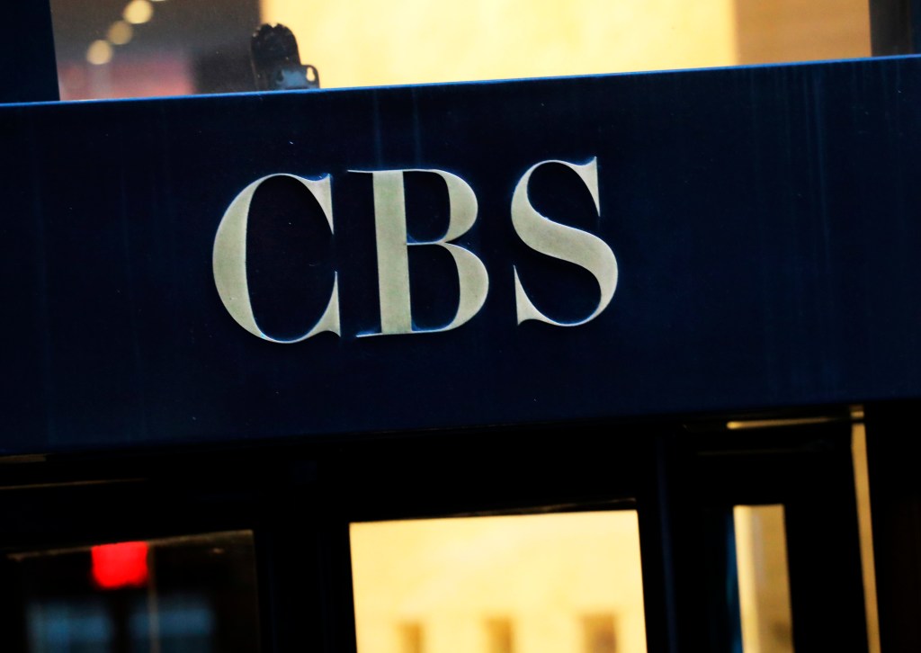 CBS logo displayed at the entrance of its headquarters in New York, December 6, 2018