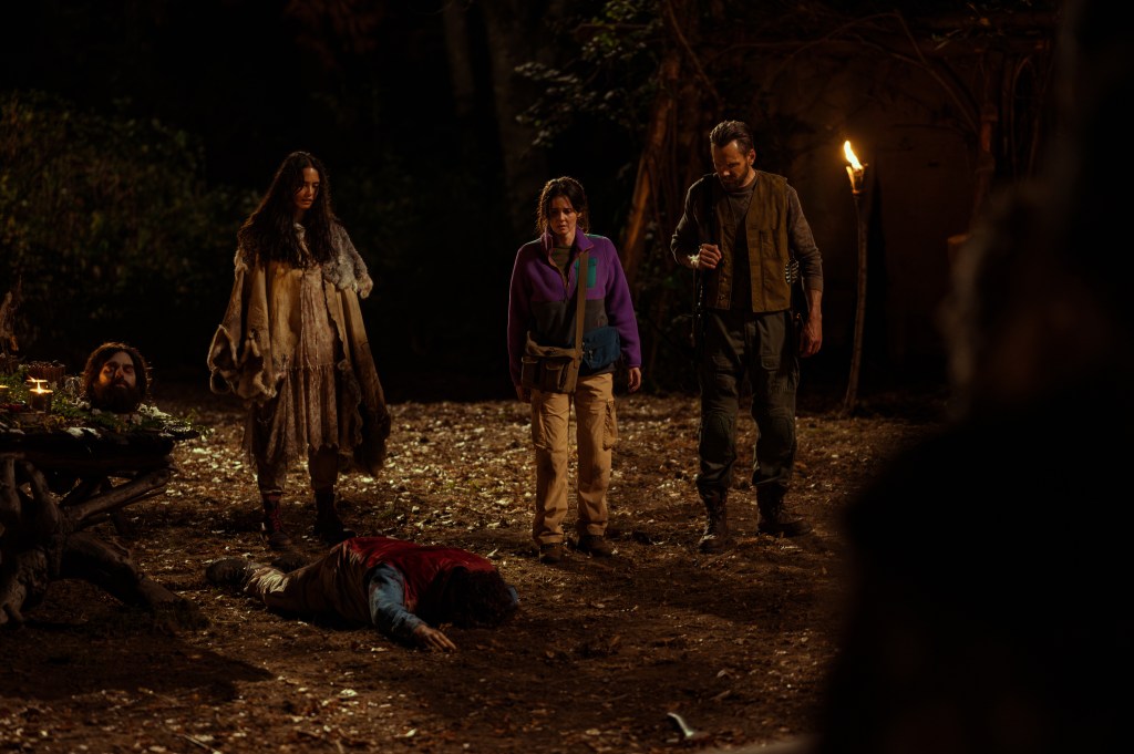 L-R: Courtney Eaton as Teen Lottie, Nelson Franklin as Edwin, Ashley Sutton as Hanna and Joel McHale as Kodiak in Yellowjackets, episode 7, season 3, streaming on Paramount+ with SHOWTIME, 2025.