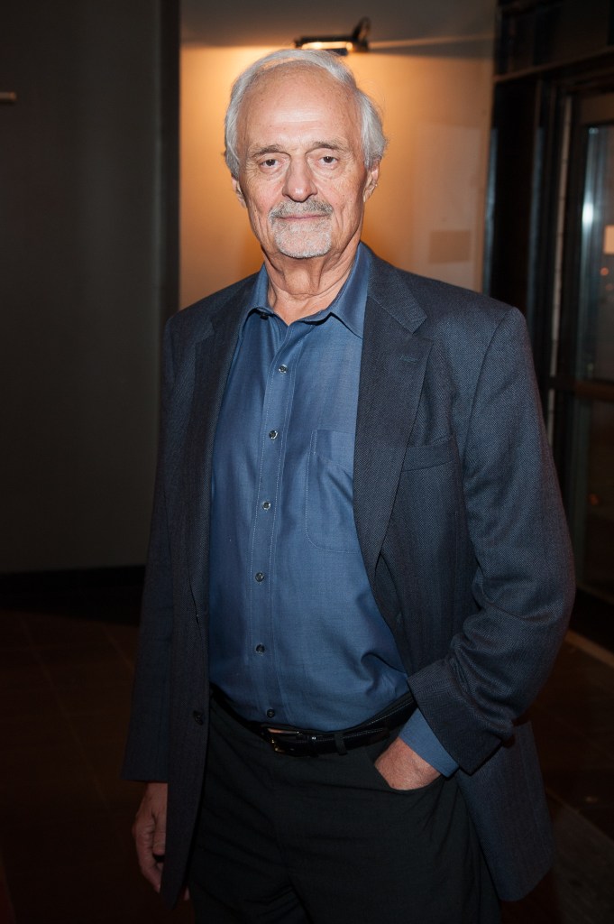 Director Ted Kotcheff in a blue shirt and black jacket attending the New York premiere of 'Wake In Fright' on October 5, 2012