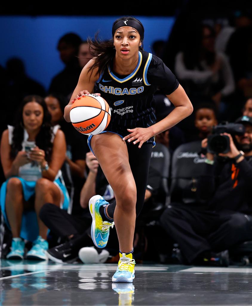 Chicago Sky forward Angel Reese (5) dribbles the ball against the New York Liberty during the first half at the Barclays Center.