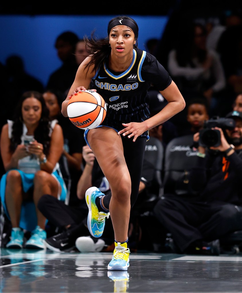 Chicago Sky forward Angel Reese (5) dribbles the ball against the New York Liberty during the first half at the Barclays Center.