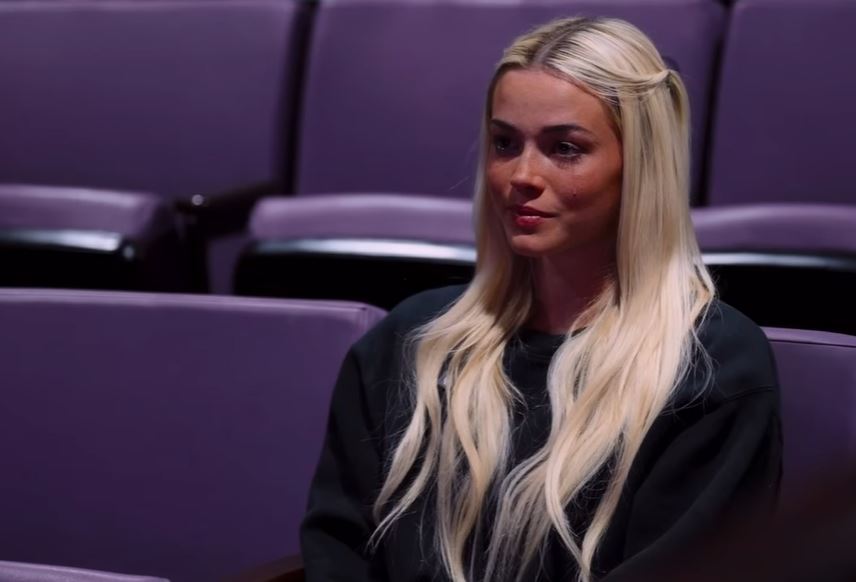 LSU gymnastic Livvy Dune sheds a tears after watching a video to officially say farewell to gymnastics.