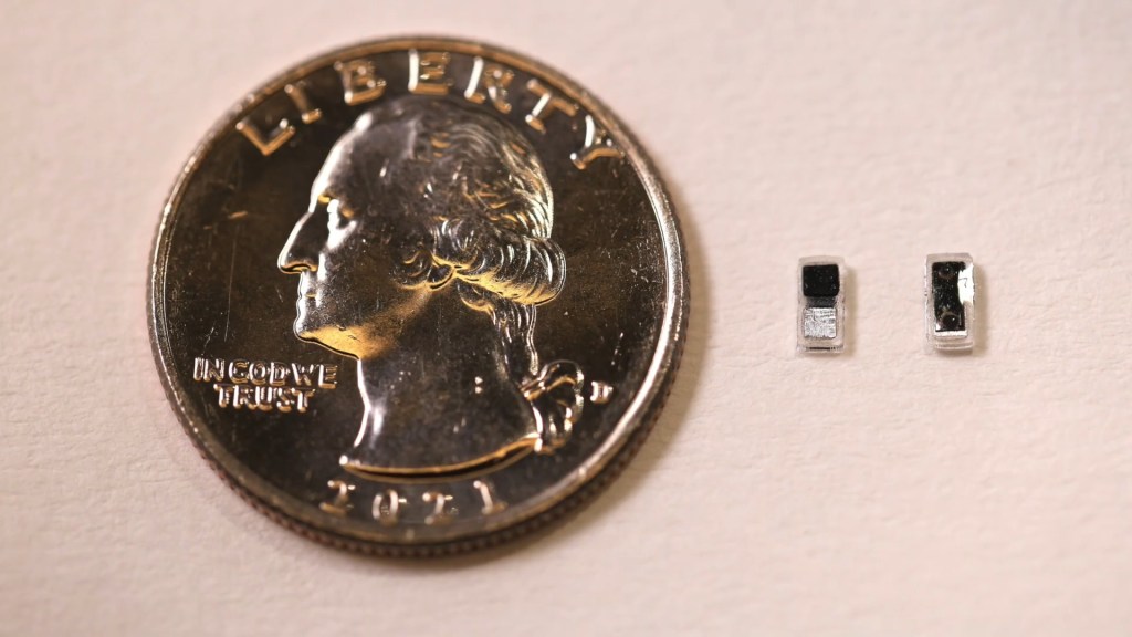 The pacemaker next to a quarter