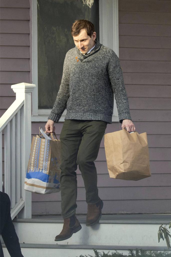 Erik Per Sullivan, known for his role as Dewey on the sitcom Malcolm in the Middle, is pictured leaving his house and picking up a coffee in Boston.