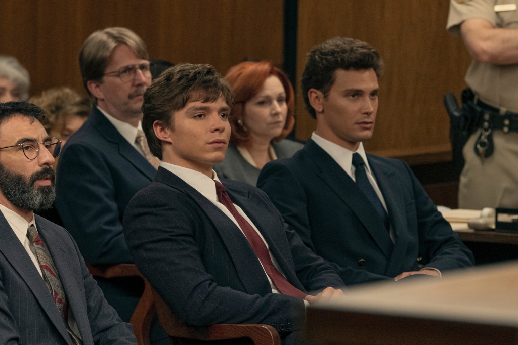 Brad Culver, Nicholas Chavez and Cooper Koch portraying characters in the TV show "Monsters: The Lyle and Erik Menendez Story" during a courtroom scene, Season 2, Episode 7.