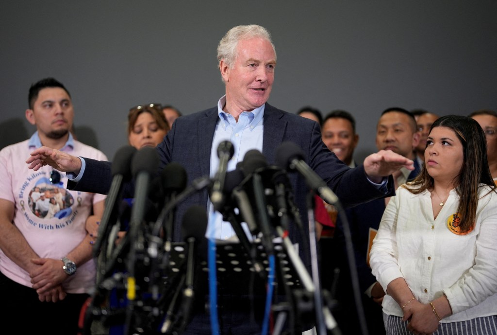 Jennifer Vasquez Sura, Cesar Abrego Garcia, and Cecilia Garcia de Abrego, the family of Kilmar Abrego Garcia, react as U.S. Senator Chris Van Hollen (D-MD) holds a press conference after returning from a visit to El Salvador.