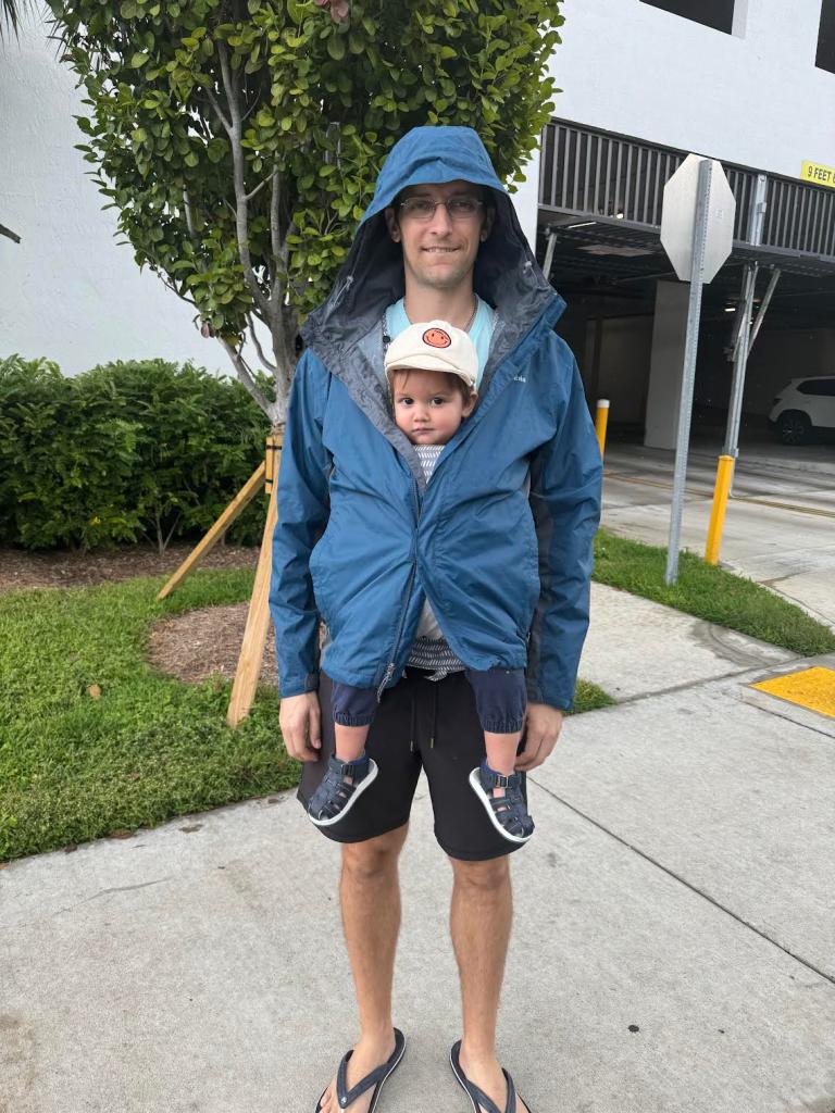 Rory Kennedy with his small child 