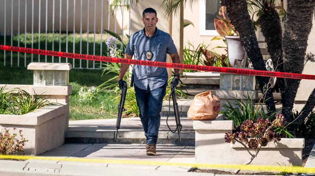 Investigators remove firearms from Judge Jeffrey Ferguson's residence in Anaheim, Calif., on Aug. 4, 2023.