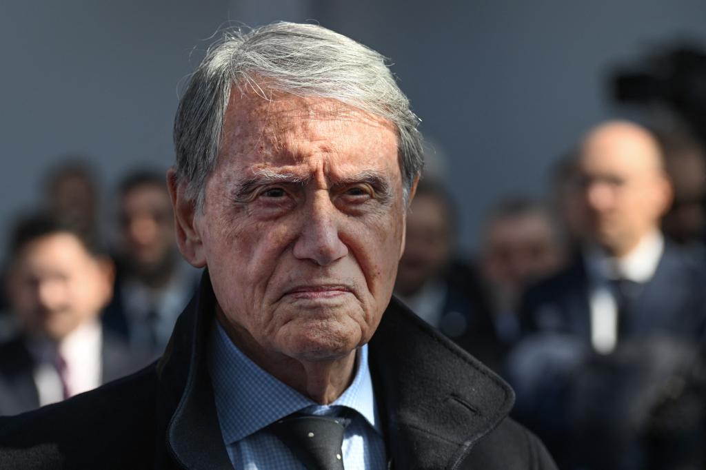 Italian President of MSC, Gianluigi Aponte, in a suit attending the inauguration ceremony of the MSC Worlds America cruise ship at a shipyard in France.