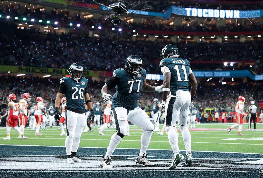 A.J. Brown and Mekhi Becton of the Philadelphia Eagles celebrating a touchdown against the Kansas City Chiefs during Super Bowl LIX at Caesars Superdome