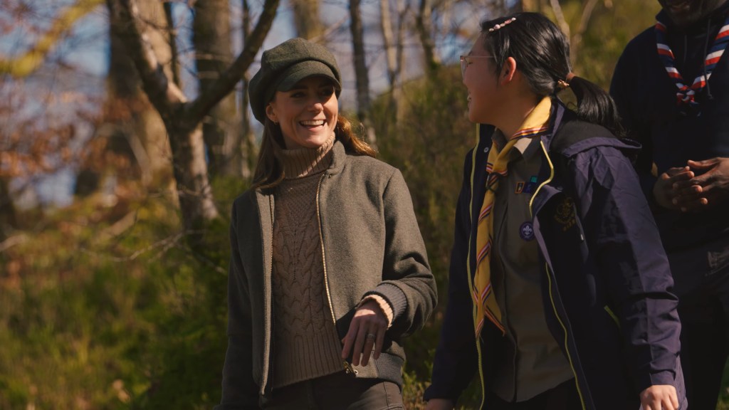 Kate Middleton smiling and conversing with another woman in a video released by Kensington Palace