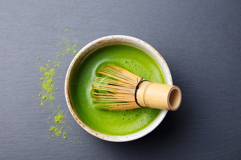 Ash prepares green tea in the morning and matcha tea with collagen and colostrum powder in the afternoon. Matcha tea is pictured here.