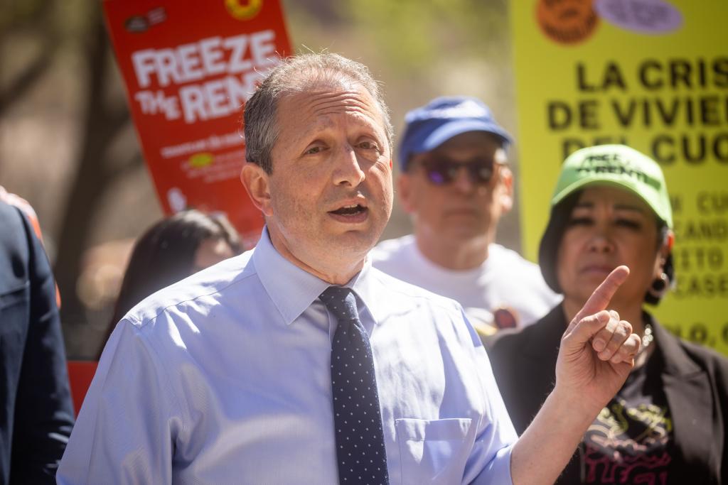 Mayoral candidates Brad Lander, Zohran Mamdani, Adrienne Adams and Zellnor Myrie at a tenants rights rally in City Hall Park, New York City, opposing Andrew Cuomo, with Lander pointing upwards