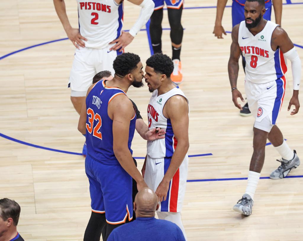 Karl-Anthony Towns of the New York Knicks and Tobias Harris of the Detroit Pistons exchanging words in the 3rd quarter of the NBA Playoffs Game 4 at Little Caesars Arena