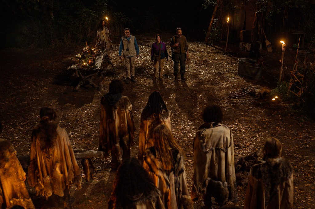 L-R: Nelson Franklin as Edwin, Ashley Sutton as Hanna and Joel McHale as Kodiak in "Yellowjackets" Season 3.