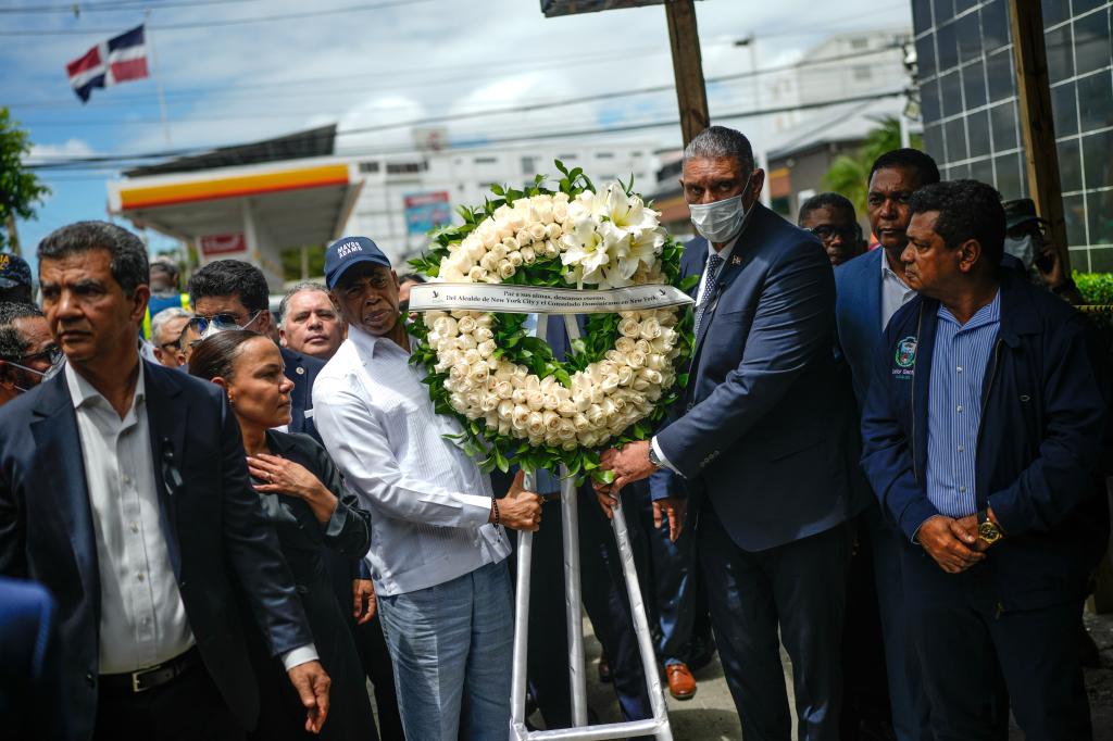 Adams left a wreath at the memorial during his visit.
