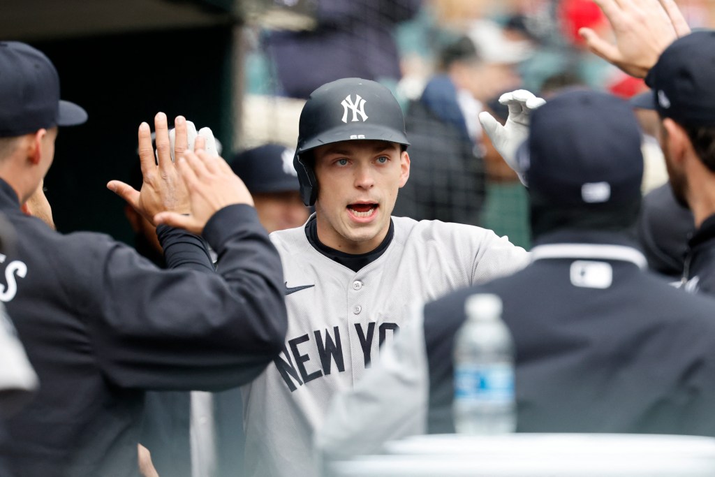 Ben Rice celebrates after hitting a home run during the Yankees' win against the Tigers on April 9.